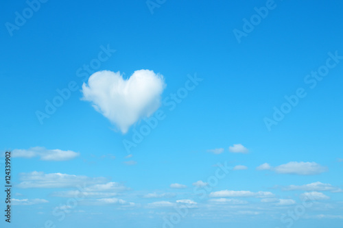 heart shaped cloud in the blue sky