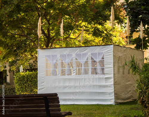 Jewish Holiday Sukkot . A sukkah is a temporary hut constructed for use during the week-long Jewish festival of Sukkot. Static shooting photo