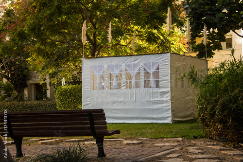 Jewish Holiday Sukkot . A sukkah is a temporary hut constructed for use during the week-long Jewish festival of Sukkot. Static shooting photo