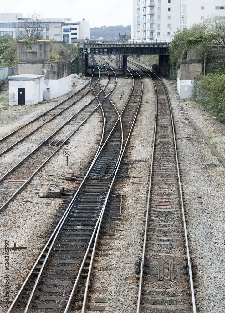 Obraz premium Railway lines passing under a bridge