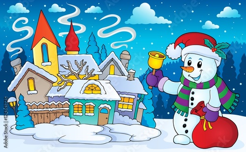 Christmas snowman in winter scenery