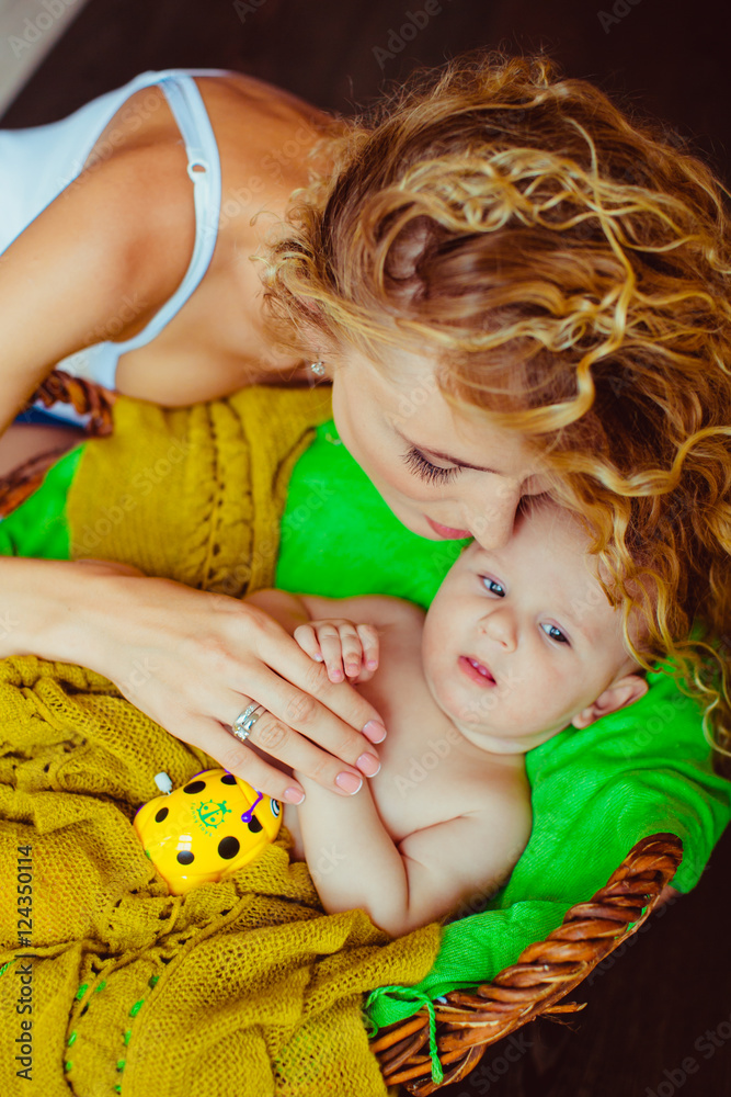 beautiful mother kissing her son beautiful mother kissing her son
