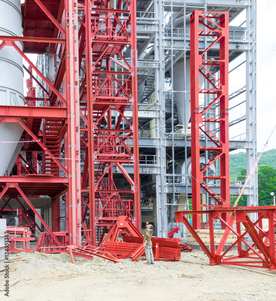 Worker millwright industrial construction makes accounting metal parts Worker millwright industrial construction makes accounting metal parts