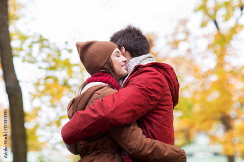 happy young couple hugging in autumn park © Syda Productions