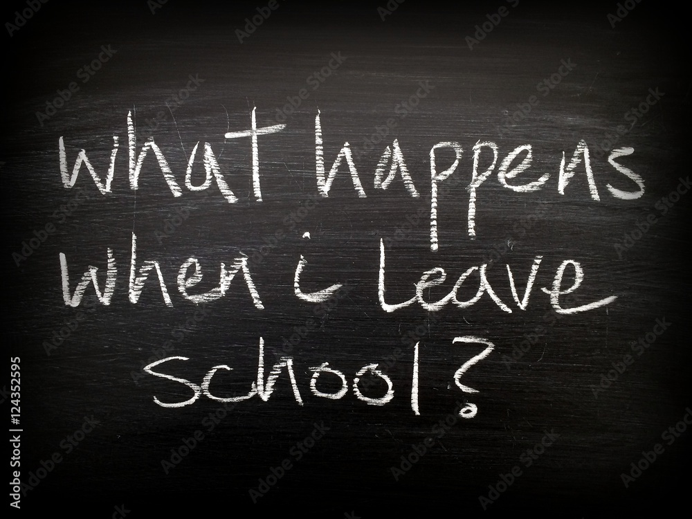 The question What Happens When I Leave School written in white chalk on a used blackboard. A vignette has been added for effect