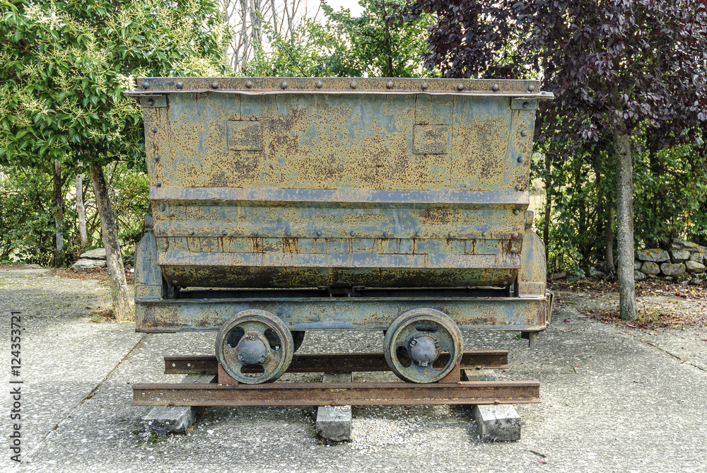old mining car in the town of Revilla of Santullan in Palencia, Castile and León, Spain old mining car in the town of Revilla of Santullan in Palencia, Castile and León, Spain