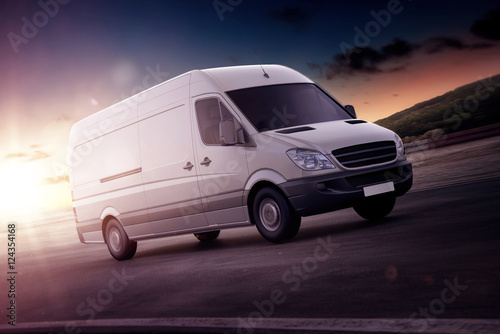 Canvas Print White van for freight haulage on a freeway