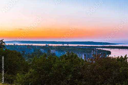 View from the hill to the Dnieper and the evening urban landscape on the bank. Ukraine