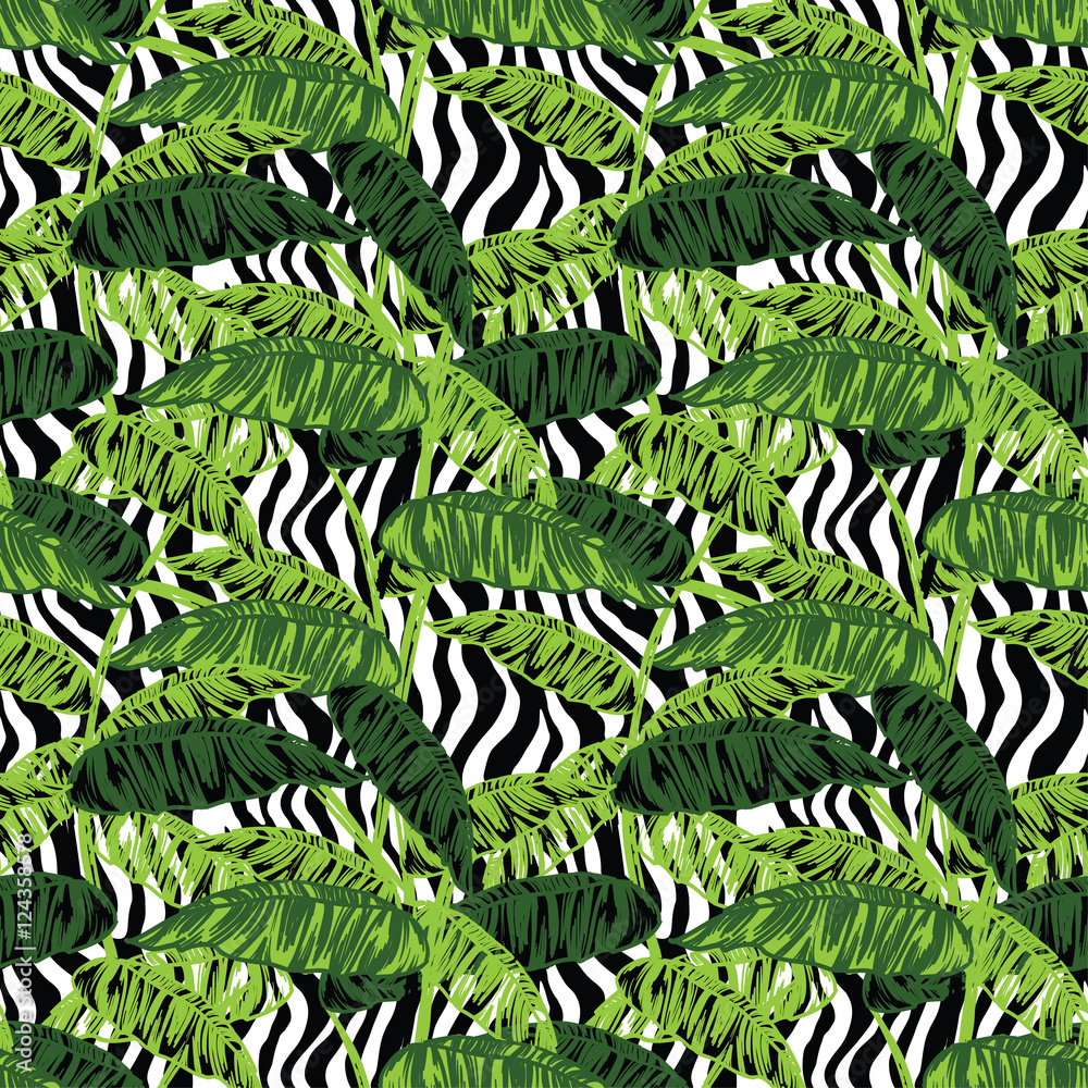 Fototapeta premium Tropical leaves on animal pattern. Seamless, hand painted.