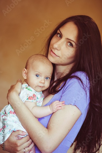 Pretty mother with cute little baby