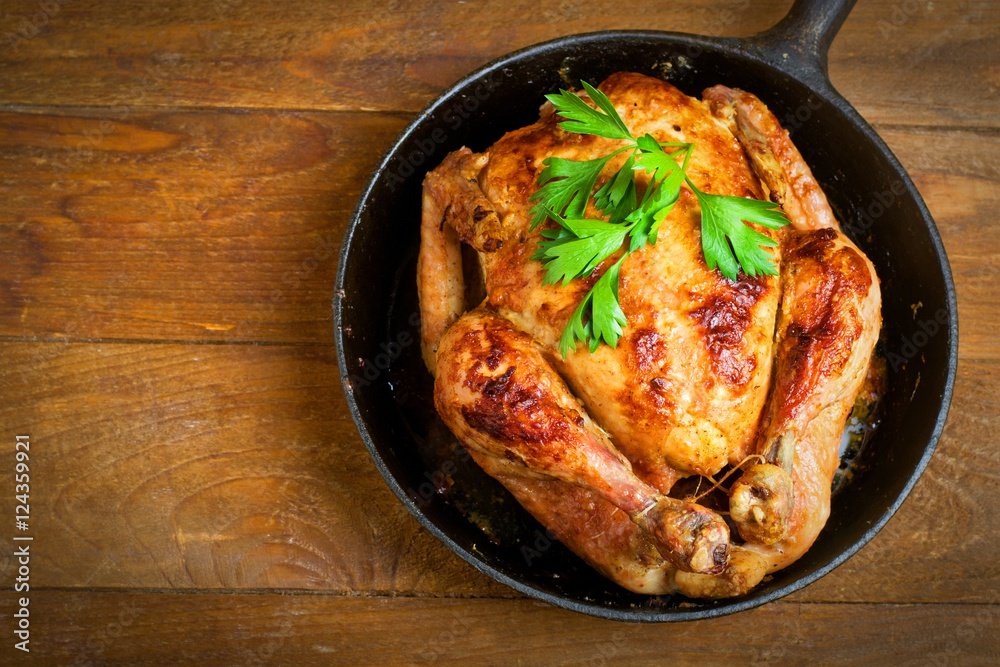 baked chicken,Style rustic.Selective focus.Top view, space for text. baked chicken,Style rustic.Selective focus.Top view, space for text.