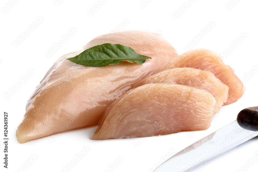 Whole skinned deboned raw chicken breast isolated on white.