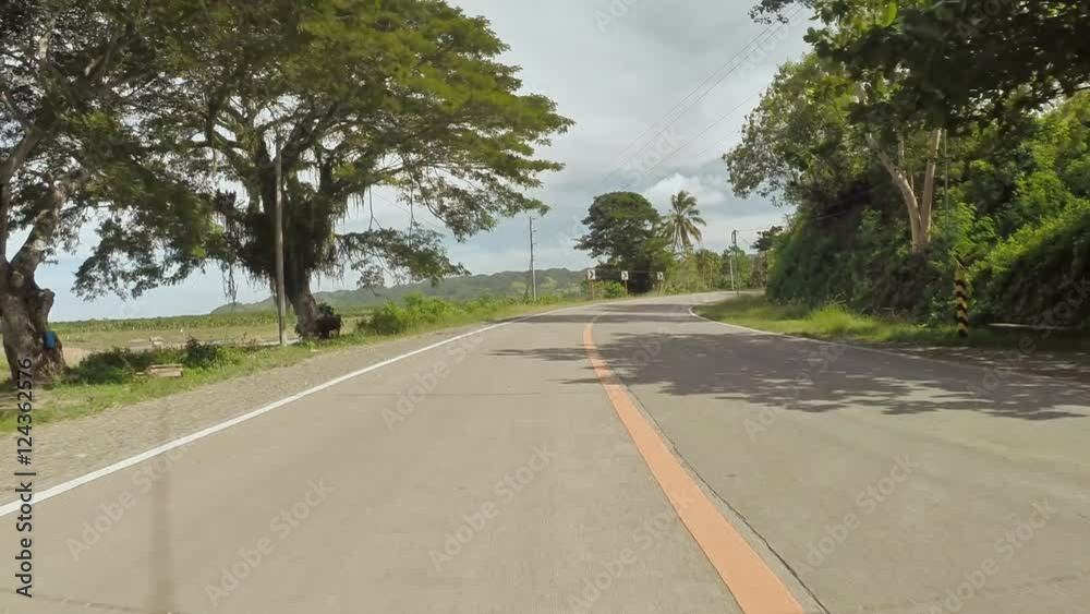 Village Road. Motion on motorbike. Philippines. Bohol island.
