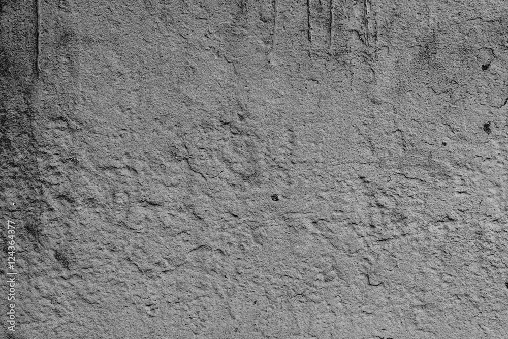 Fototapeta premium Wall fragment with scratches and cracks
