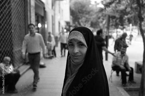 Beautiful Muslim woman spending time on traditional Iranian baza © Jasmin Merdan