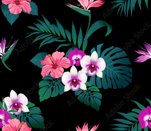 Fototapeta Naklejka Na Ścianę i Meble -  Tropical flowers and leaves on black background. Seamless. Vector.