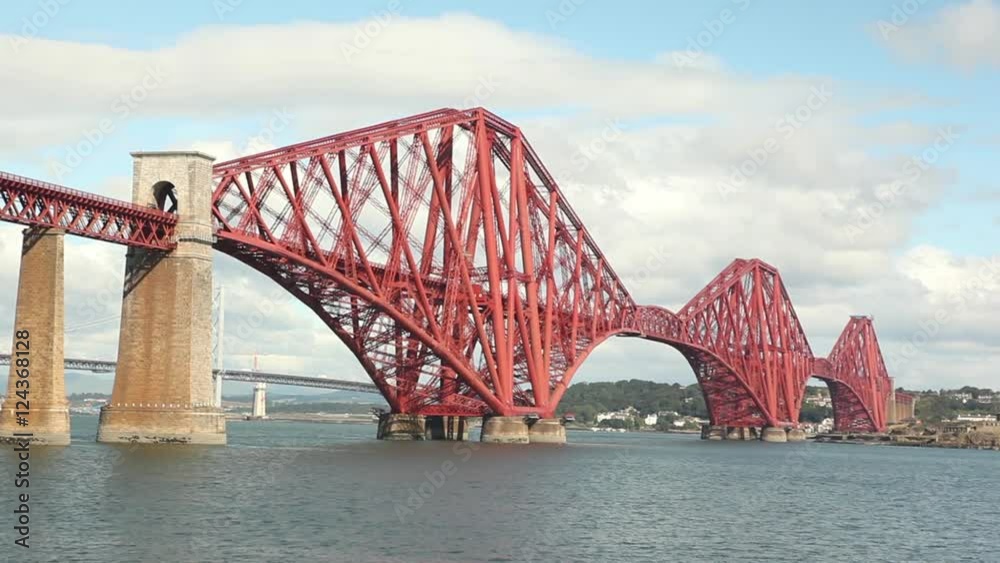 big red metal construction over river, commuters bridge Forth bridge Scotland big red metal construction over river, commuters bridge Forth bridge Scotland