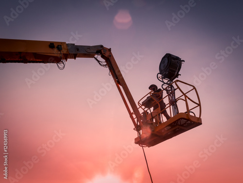 Lighting technician working on a shoot