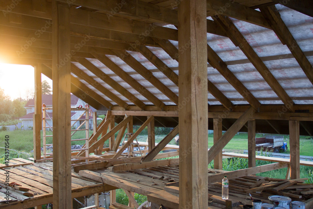 Fototapeta premium construction of wood frame residential building