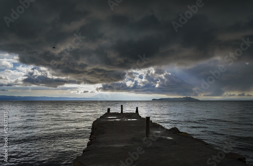 Bad weather above the Yumani dock at Lake Titicaca photo