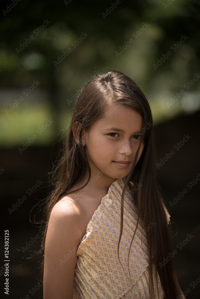 Portrait of mixed-race beautiful long hair girl wear Thai local Portrait of mixed-race beautiful long hair girl wear Thai local