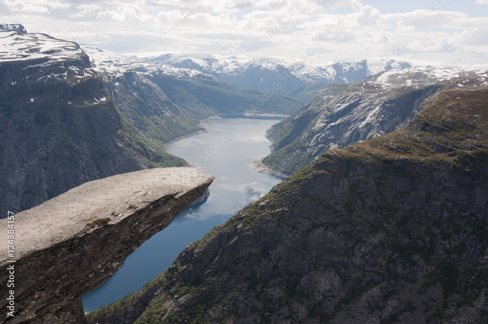 Norway, Trolltunga. Trolltunga is a piece of rock jutting horizontally out of a mountain about 700 metres above the north side of the lake Ringedalsvatnet, Norway.