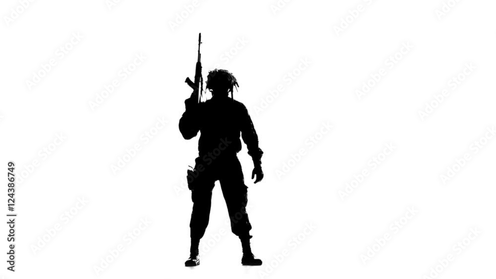 Soldier aimed and looking around. Silhouette Soldier aimed and looking around. Silhouette