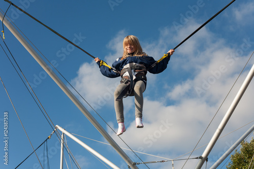 Little girl enjoying jumping