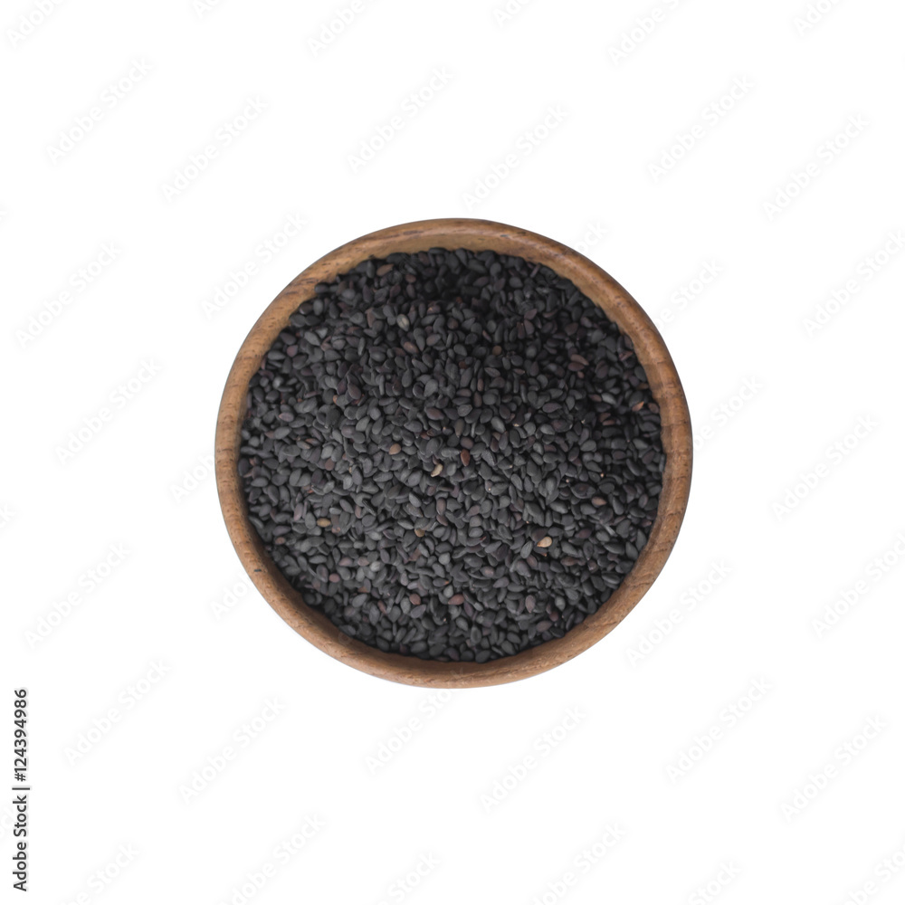 black sesame in wooden bowl on white background