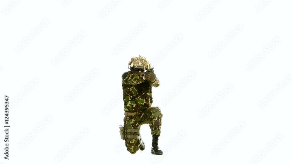 Armed soldier stands on one knee, and stretched his arms in front of. White backgraund Armed soldier stands on one knee, and stretched his arms in front of. White backgraund
