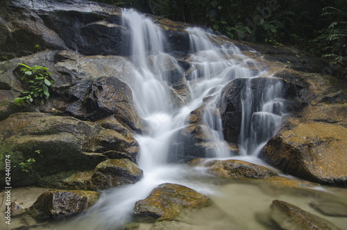 Fototapeta Naklejka Na Ścianę i Meble -  beautiful in nature, amazing cascading tropical waterfall. wet a