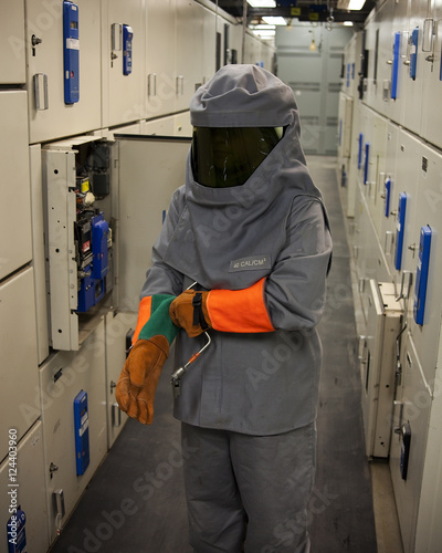 Electrical worker in protective gear photo