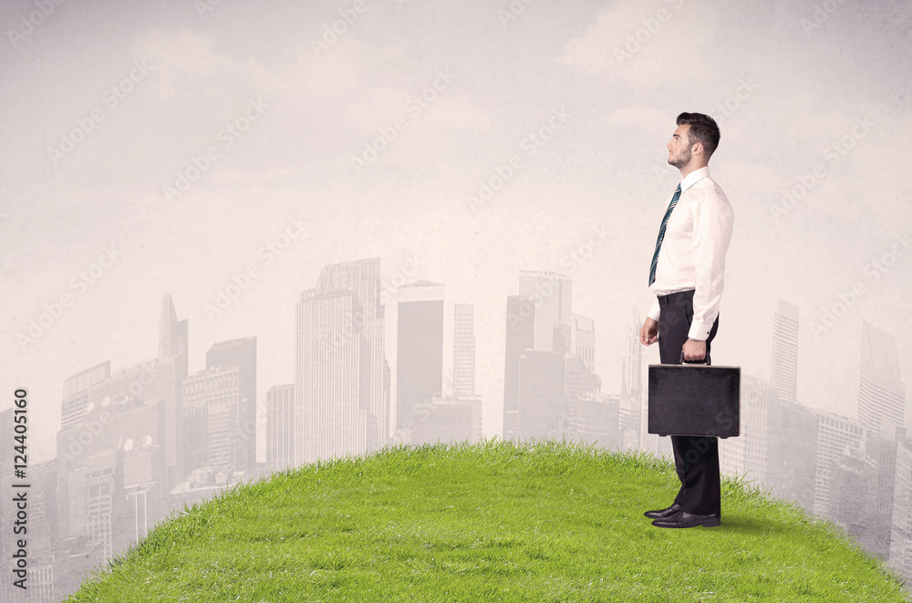 man standing in front of city landscape man standing in front of city landscape