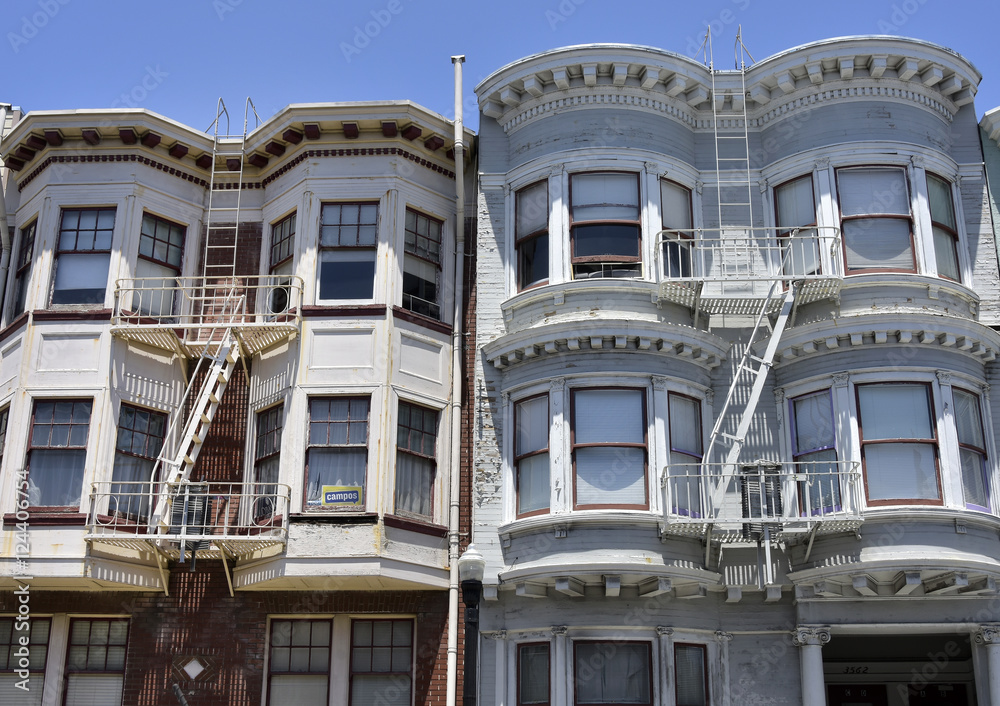 Obraz premium fire escape in San Francisco , building with windows and emerg