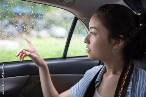 Asian girl in the car
