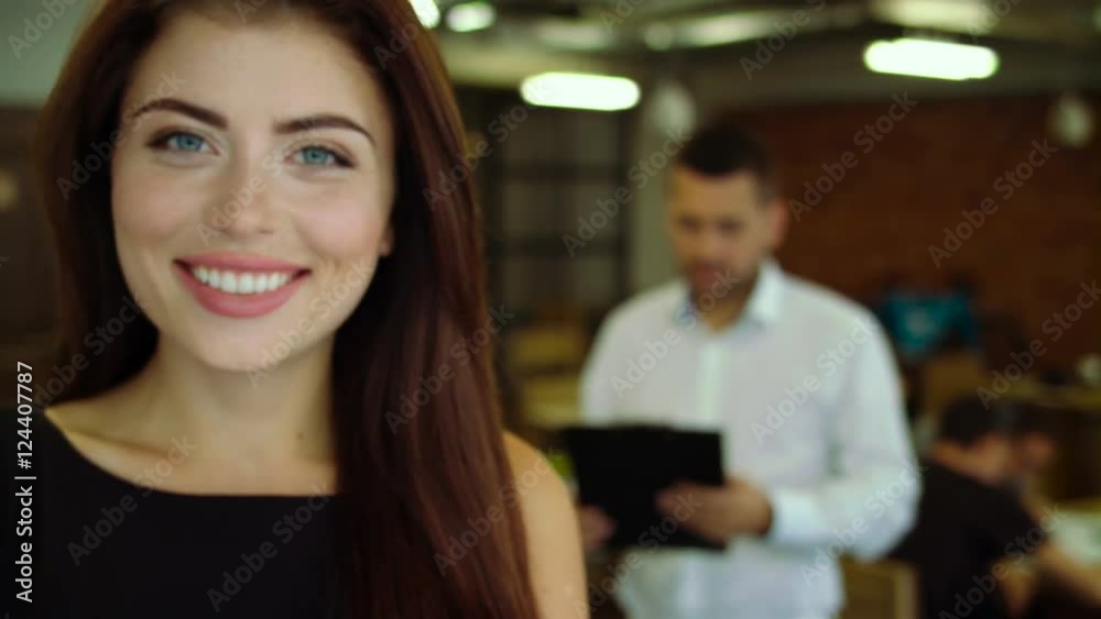 Young worker posing on camera. Young worker posing on camera.