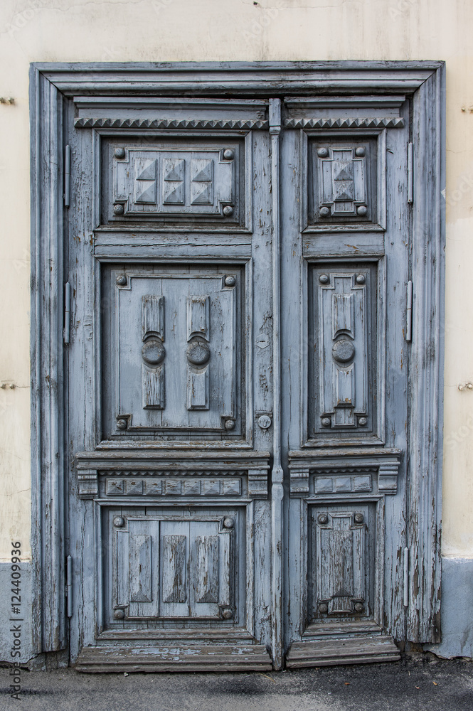 The old wooden door in blue color