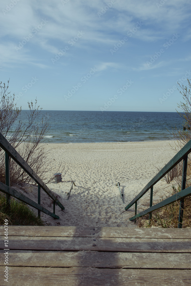walkpath to the beach made with wood and reeds walkpath to the beach made with wood and reeds