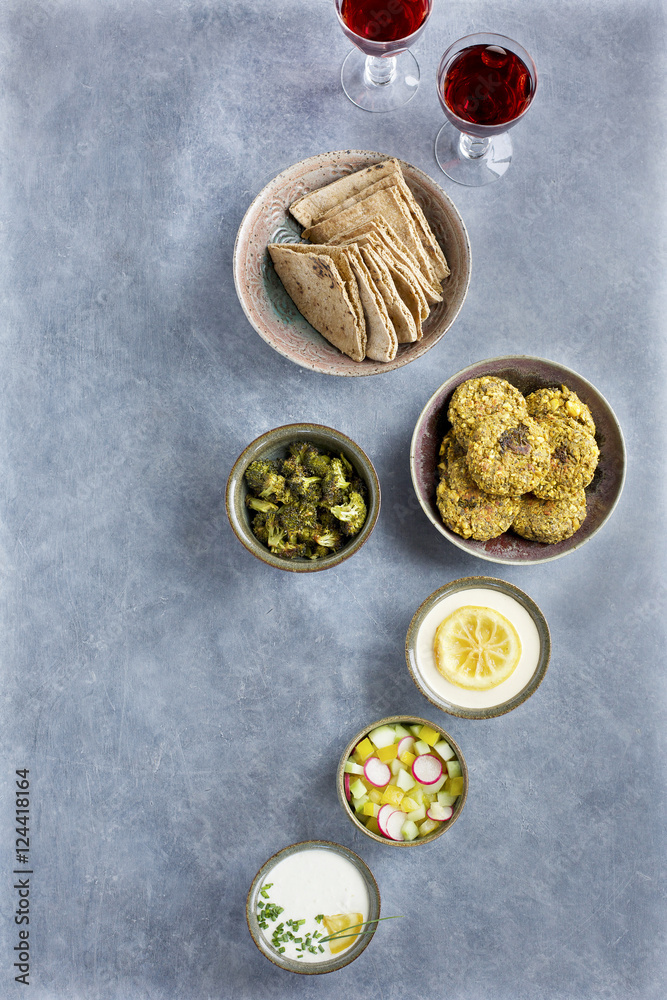 Charred Broccoli Falafel with Charred Lemon Tahini and Tzatziki