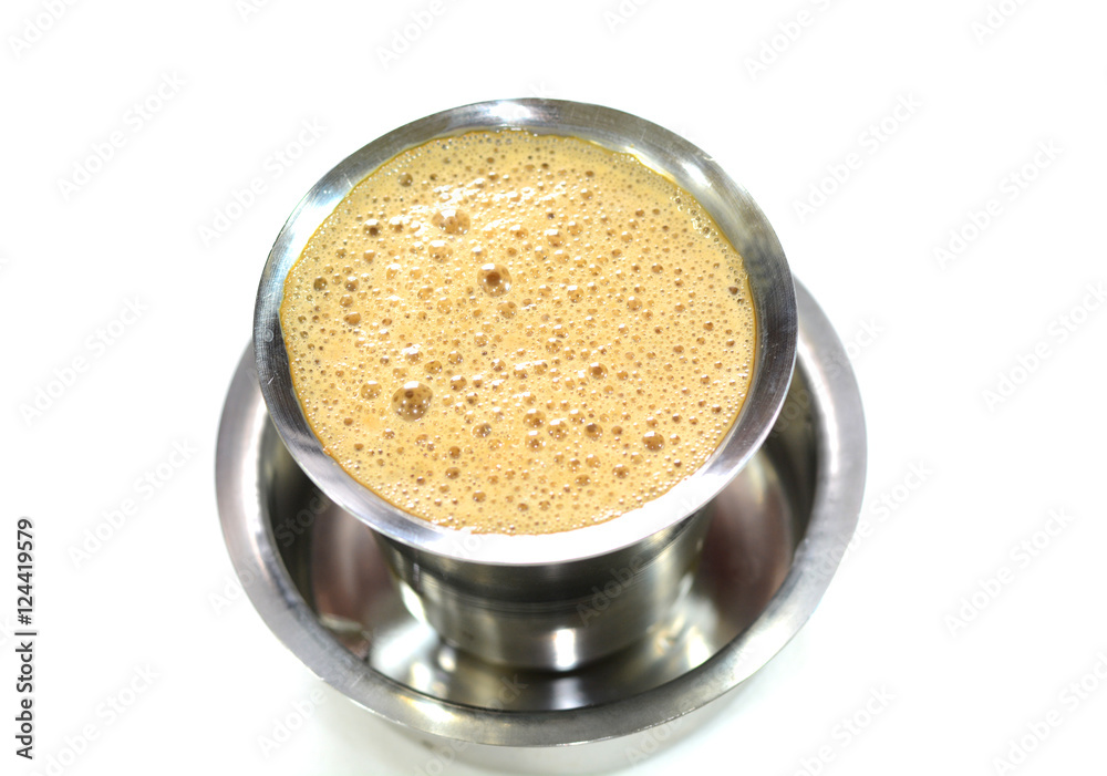 Madras filter coffee is famous coffee in India. Coffee is prepared with  roasted coffee powder, milk and sugar. It is served hot in stainless steel  cup Stock Photo | Adobe Stock