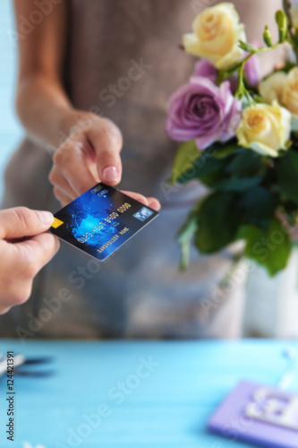 Customer giving credit card...