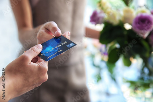 Customer giving credit card...
