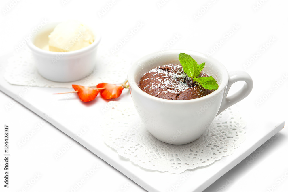 chocolate fondant in a white cup. chocolate fondant in a white cup.