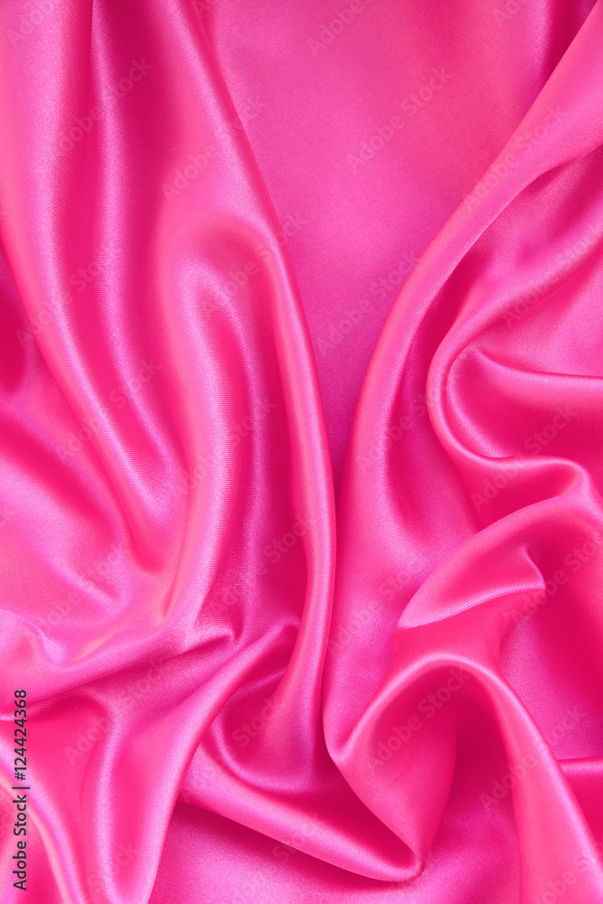 Obraz premium Smooth pink silk as background
