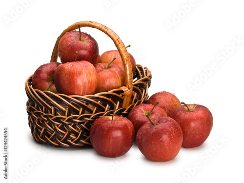 Crop of red apples in wattle basket