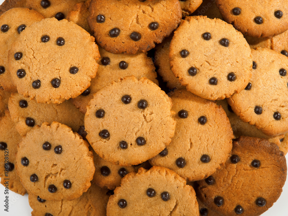 Homemade cocoa cookies with chocolate drops. Full frame, shot fr Homemade cocoa cookies with chocolate drops. Full frame, shot fr