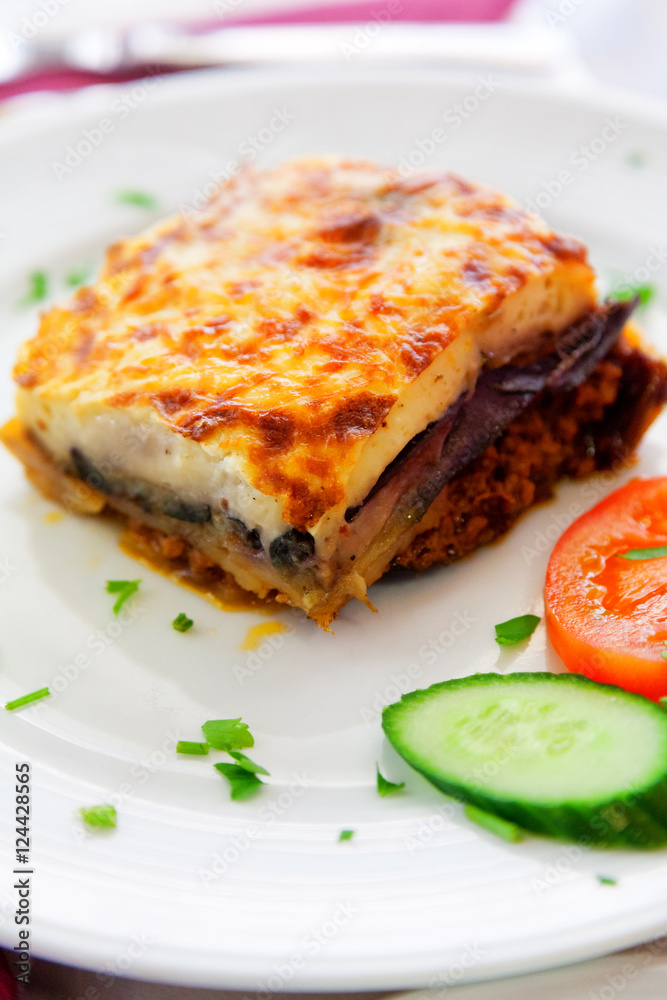 Greek style moussaka with eggplants, ground beef and potatoes. V
