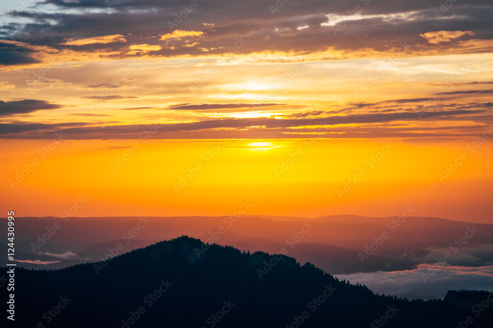 Background of Sunset Sky and Mountains clouds beautiful scenery with natural colors Landscape Travel concept aerial view