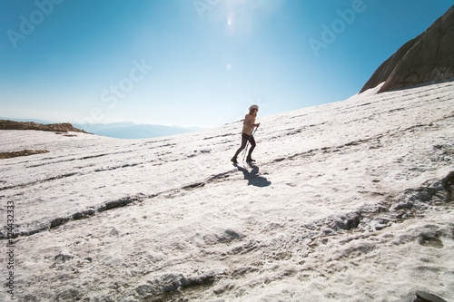 Woman Traveler climbing Travel Lifestyle concept mountains glacier on background Summer vacations activity outdoor