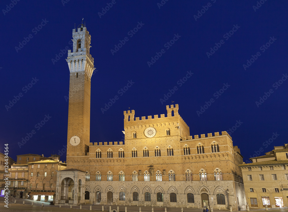 Siena square. Mangia Tower at twilight.